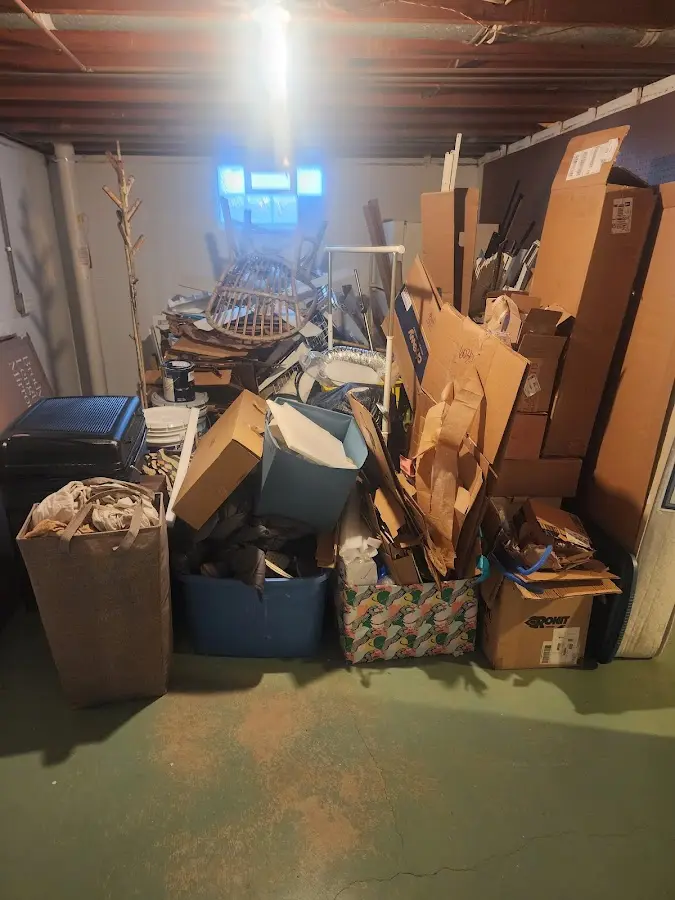 Roll-off dumpster container at job site for Yard Waste Dumpster Rental in Oronogo